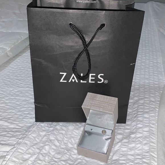 Single Diamond Halo Double Stud Earring by ZALES Jewelry The Diamond Store - Picture 1 of 15